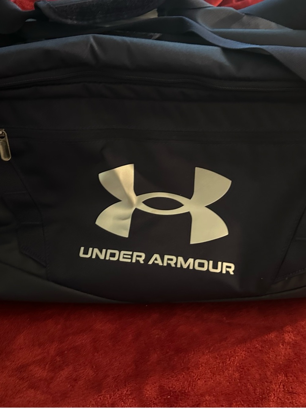 Under Armour Navy Large Duffel Bag (school logo on it)